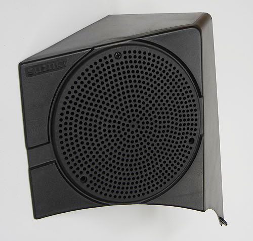Black car speaker grille with a perforated face