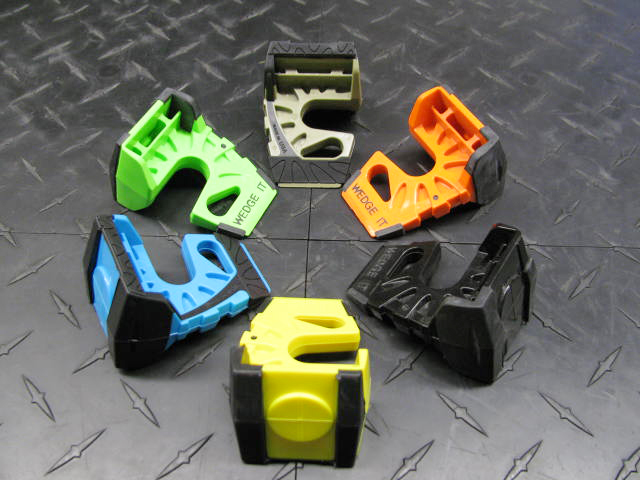 Door wedges molded in green, orange, blue, yellow and black
