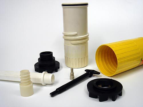 Assorted threaded caps, tubes and fittings
